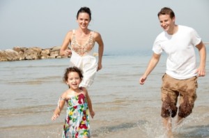 "Family In The Beach" by photostock