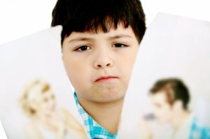 "Upset Boy With Pictures Of Parents" by David Castillo Dominici